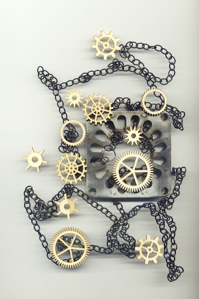 Artistic display of gears and chains, perfect for industrial-themed projects.